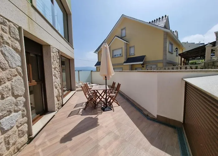 Апартаменты Playa Rapadoira - Bajos Con Terraza Фос